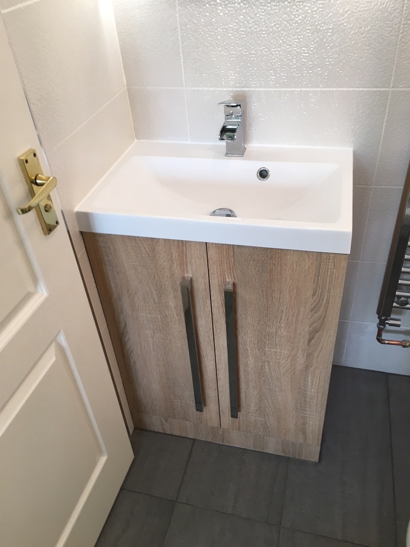 fitted bathroom vanity unit in oak